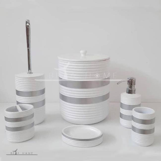 silver and white bathroom accessory set